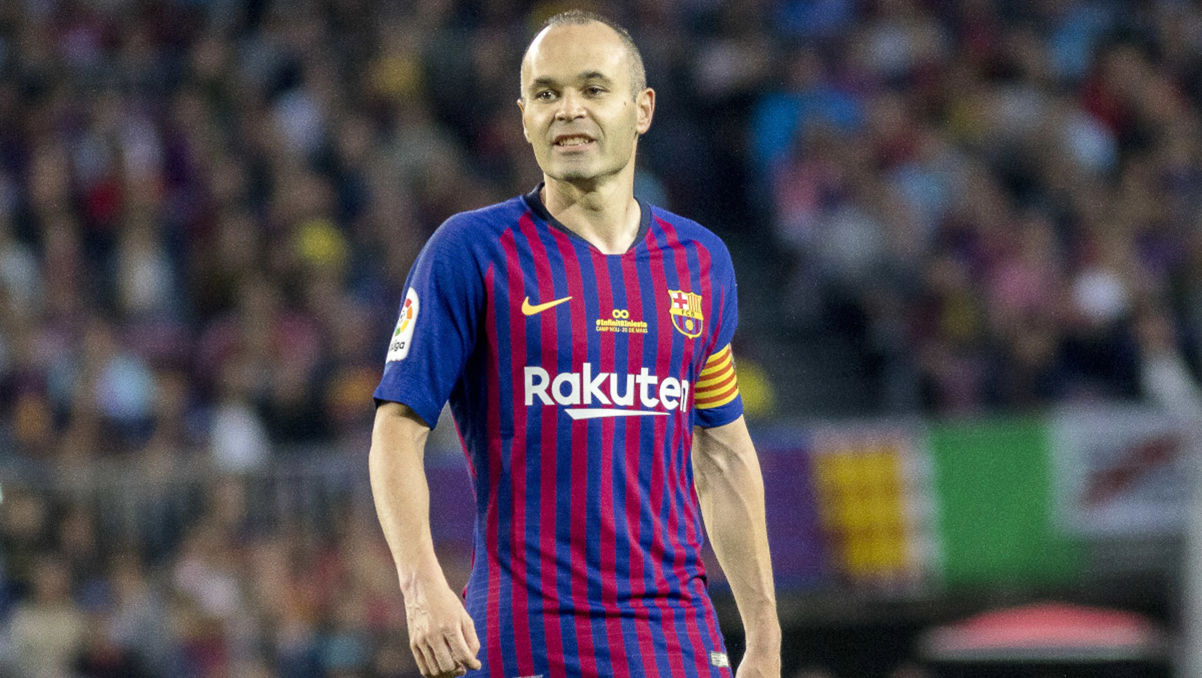 Ex-Barcelona and Spain star Iniesta retires