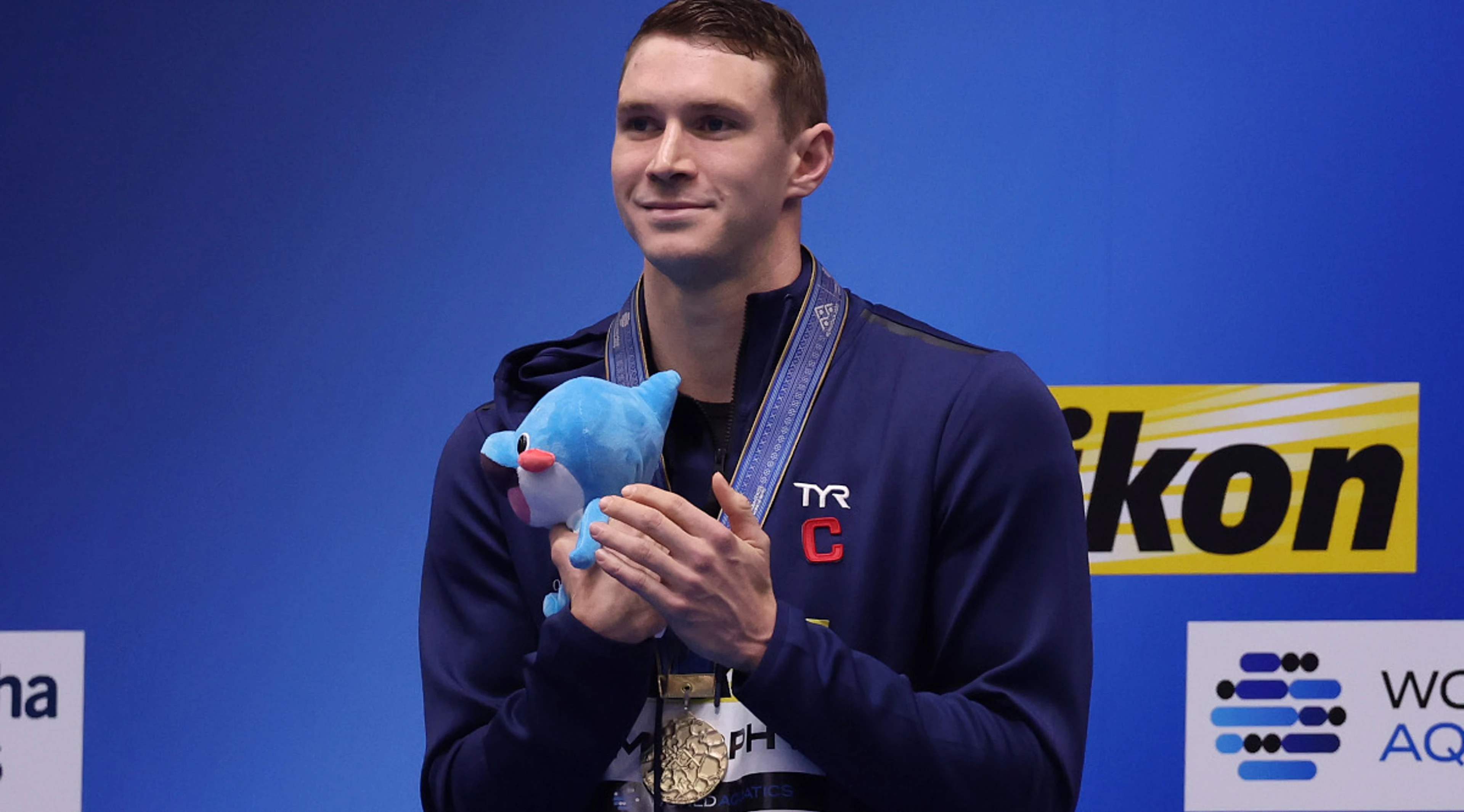 Murphy wins men's 100 backstroke world title