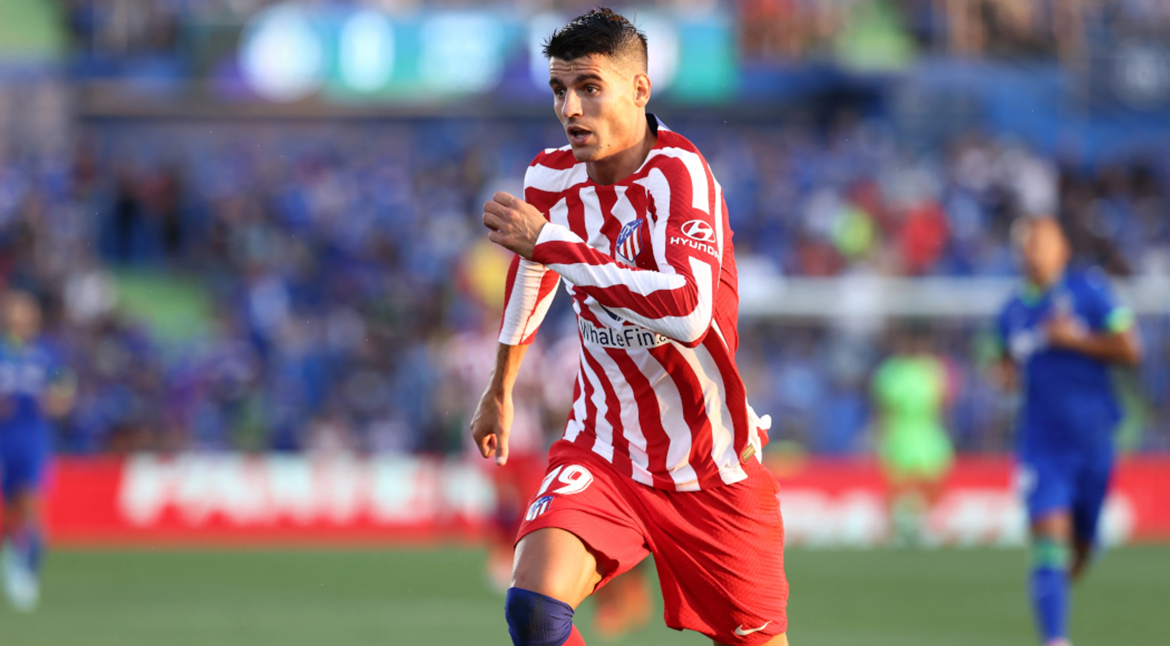 Morata double leads Atletico to win at Getafe in their opener
