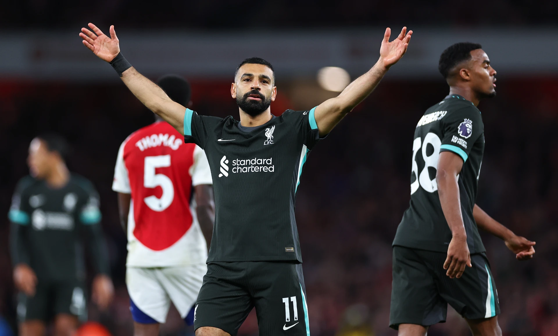 Liverpool hold Arsenal in Premier League title clash, Man Utd beaten