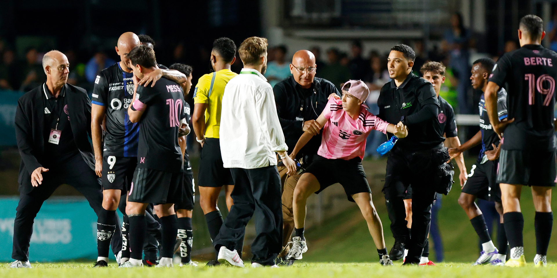 Messi knocked down by fan in Puerto Rico pitch invasion
