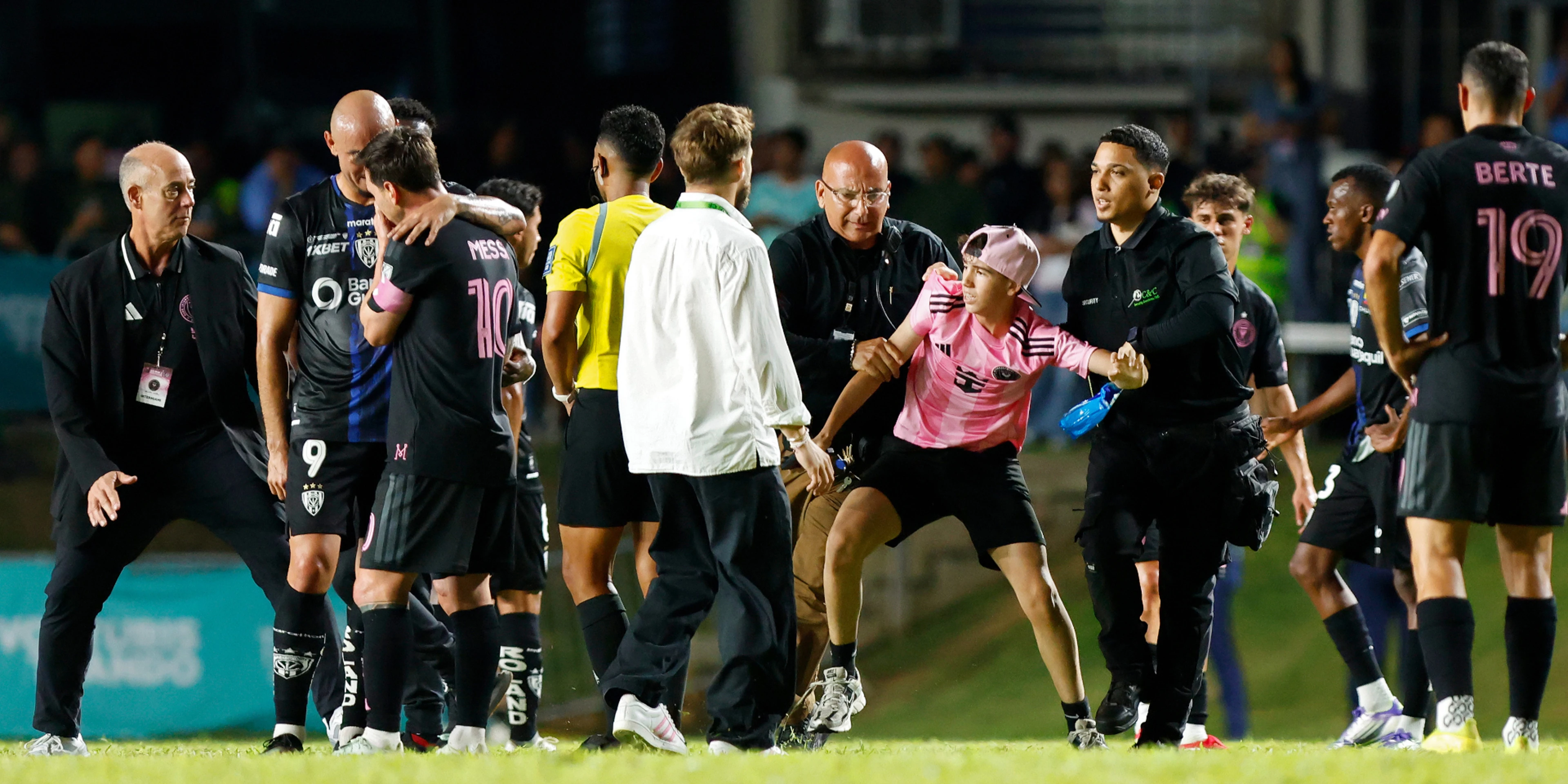 Messi knocked down by fan in Puerto Rico pitch invasion