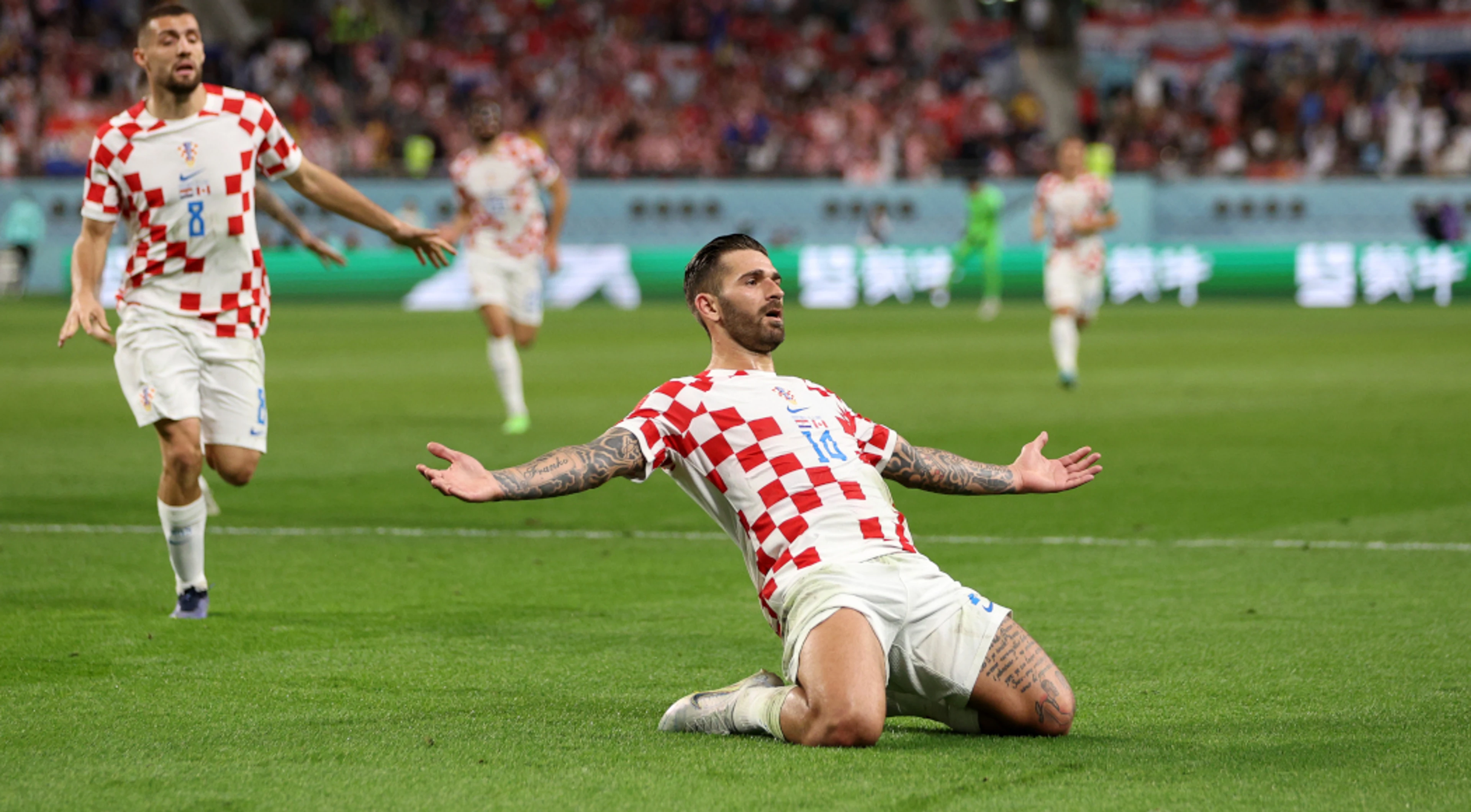 Croatia lead Canada at halftime as Davies nets historic goal