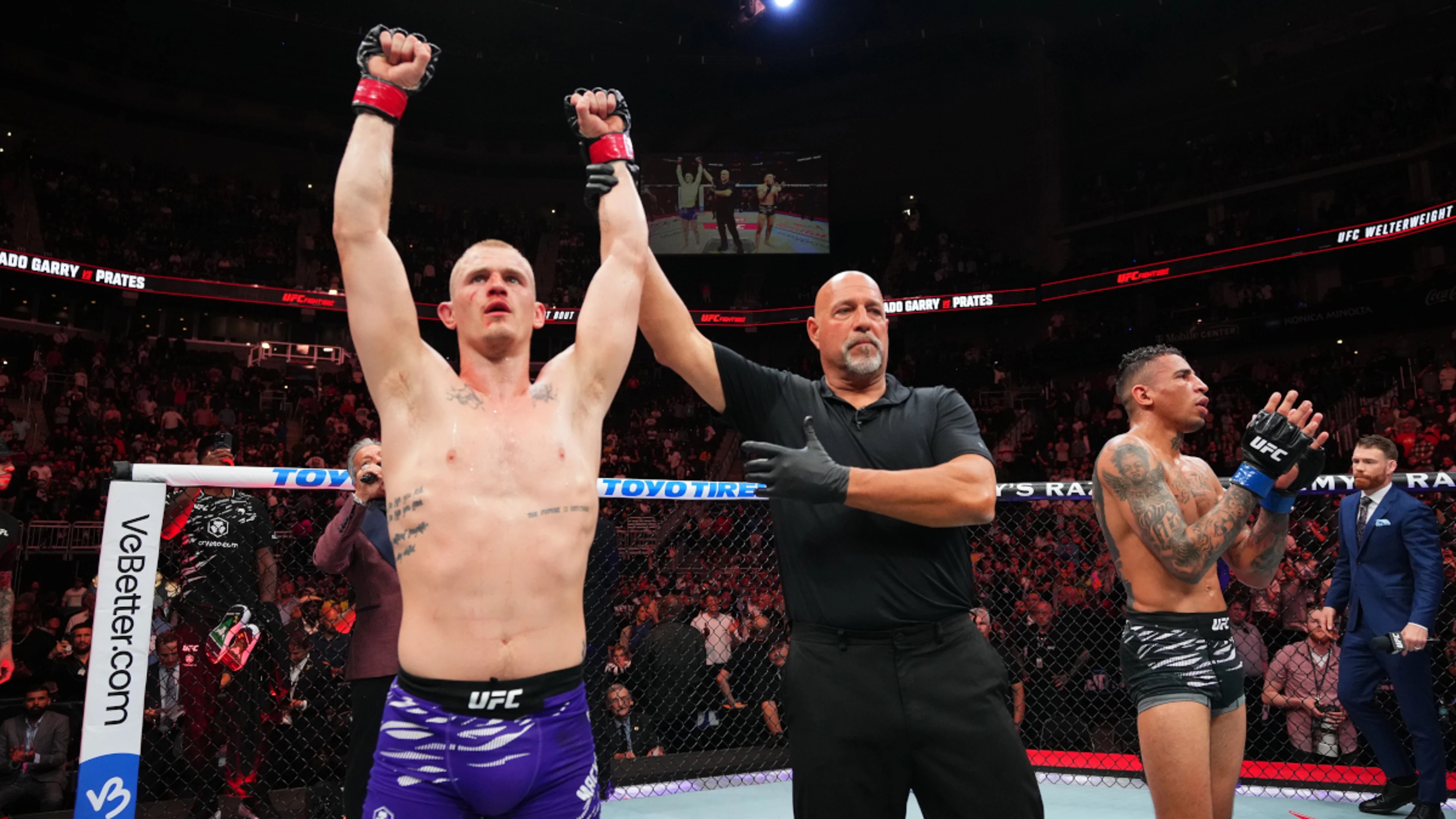 Machado Garry holds on for victory