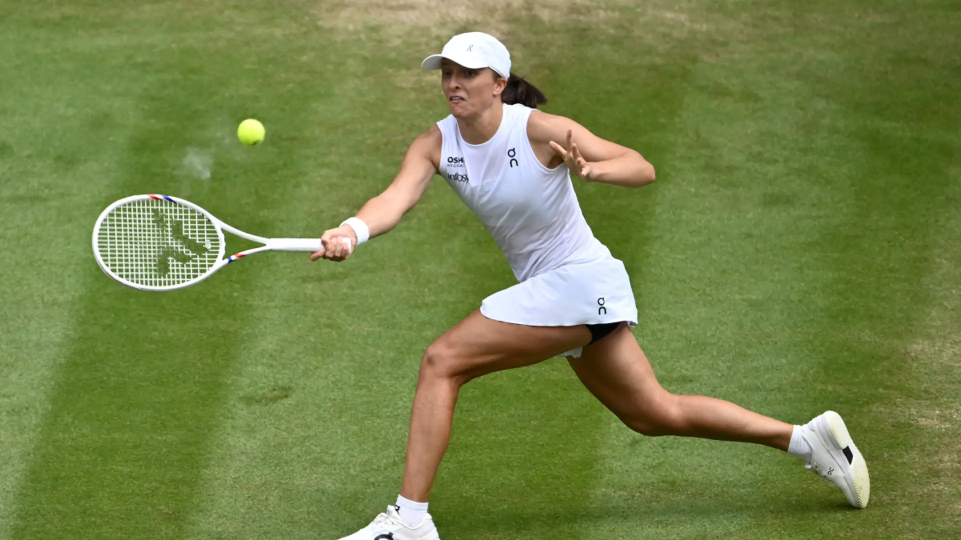 Swiatek into first Wimbledon semi-final