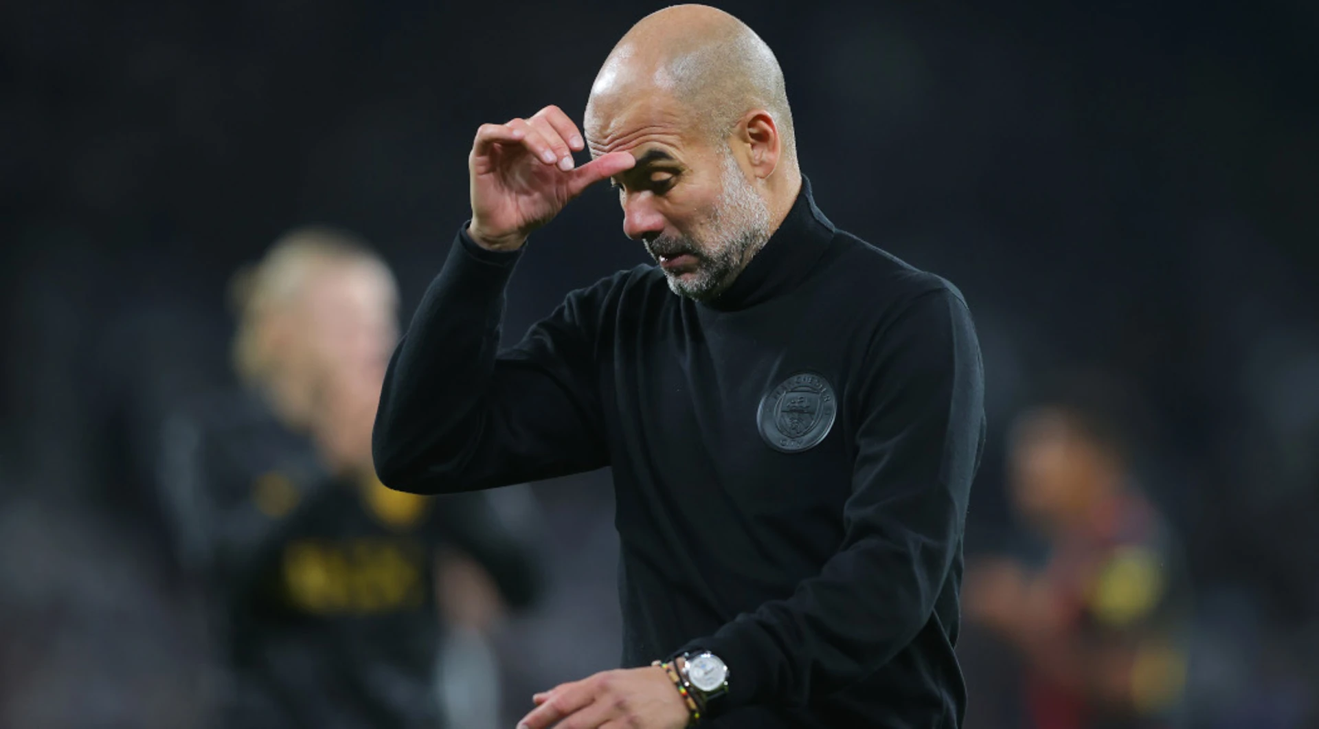 Guardiola says coins were thrown at him in Liverpool loss