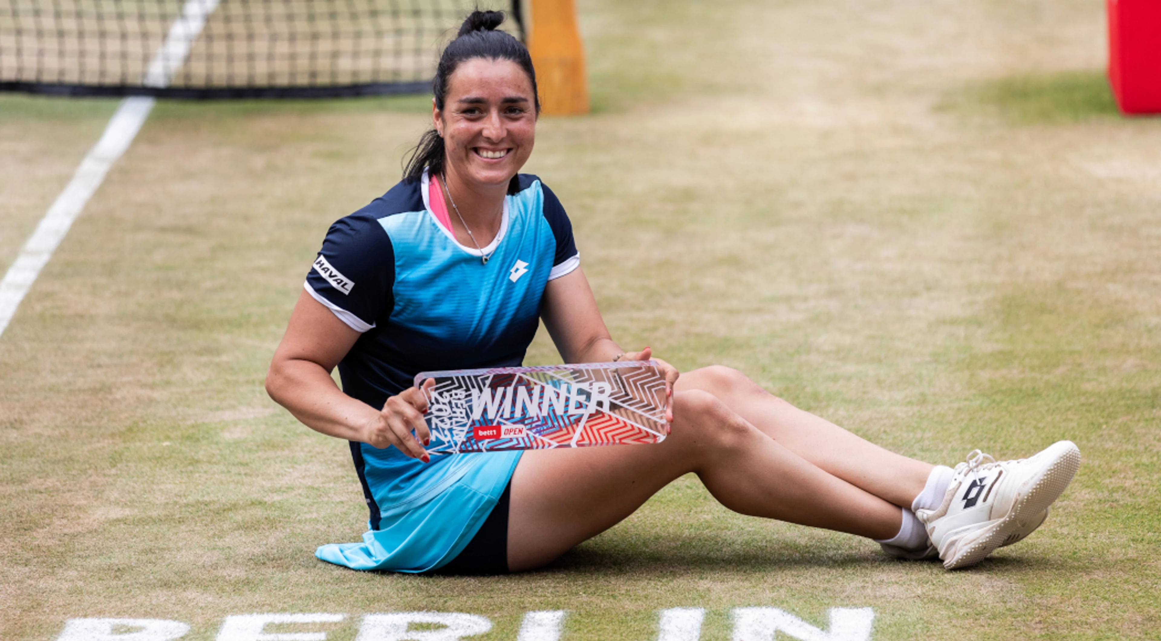 Jabeur wins WTA final in Berlin as Bencic injures ankle