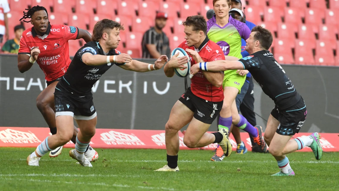 Second-half try blitz keeps 14-man Lions alive