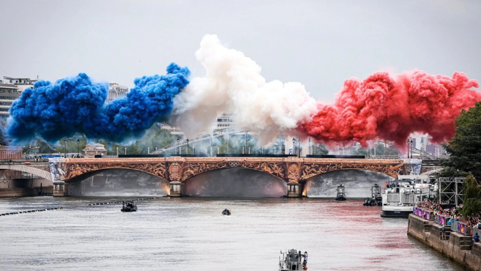 Historic river parade, Dion show-stopper ignite Paris Olympics
