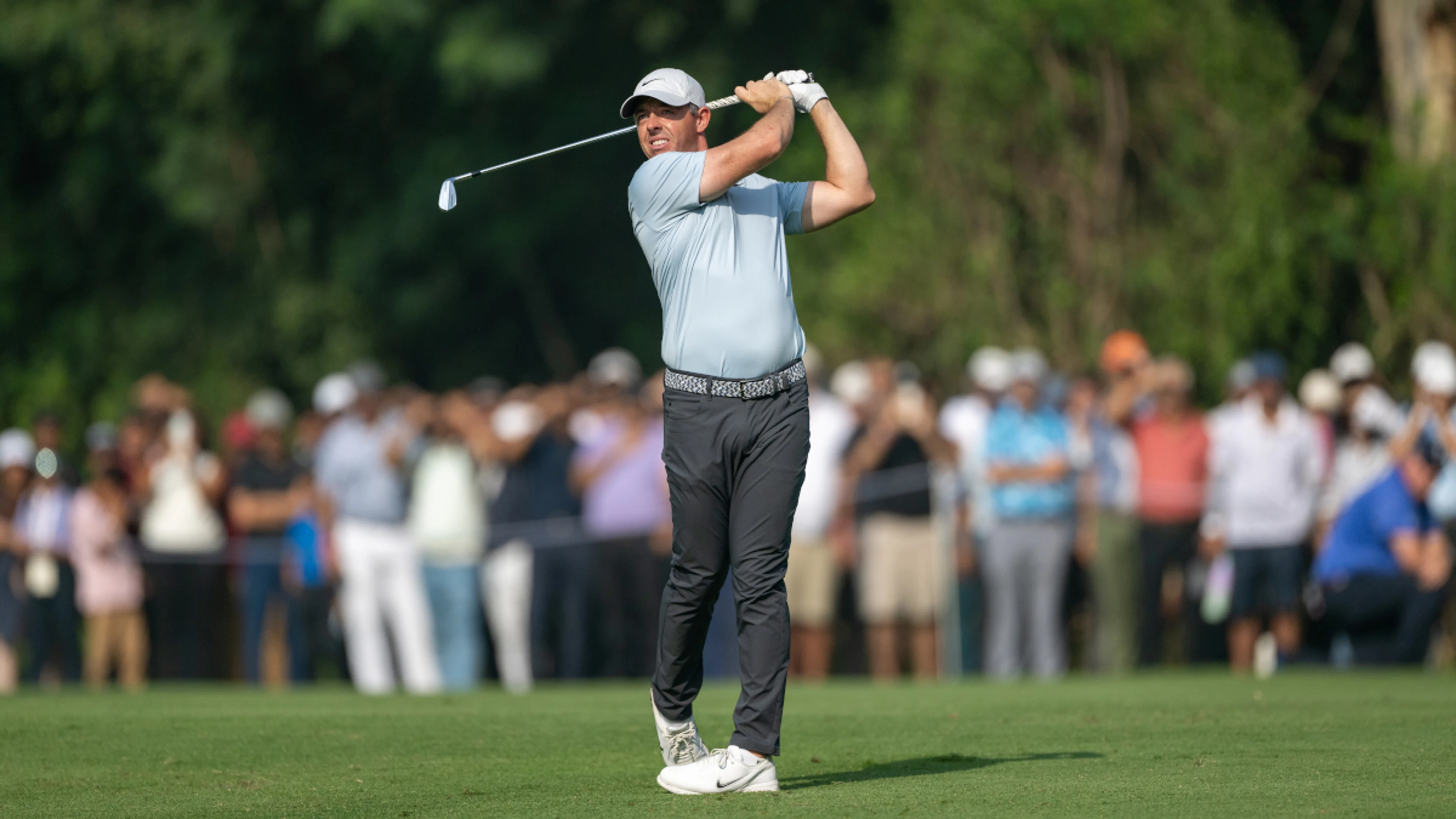 McIlroy dumps driver on India debut, Lowry leads after dog interruption