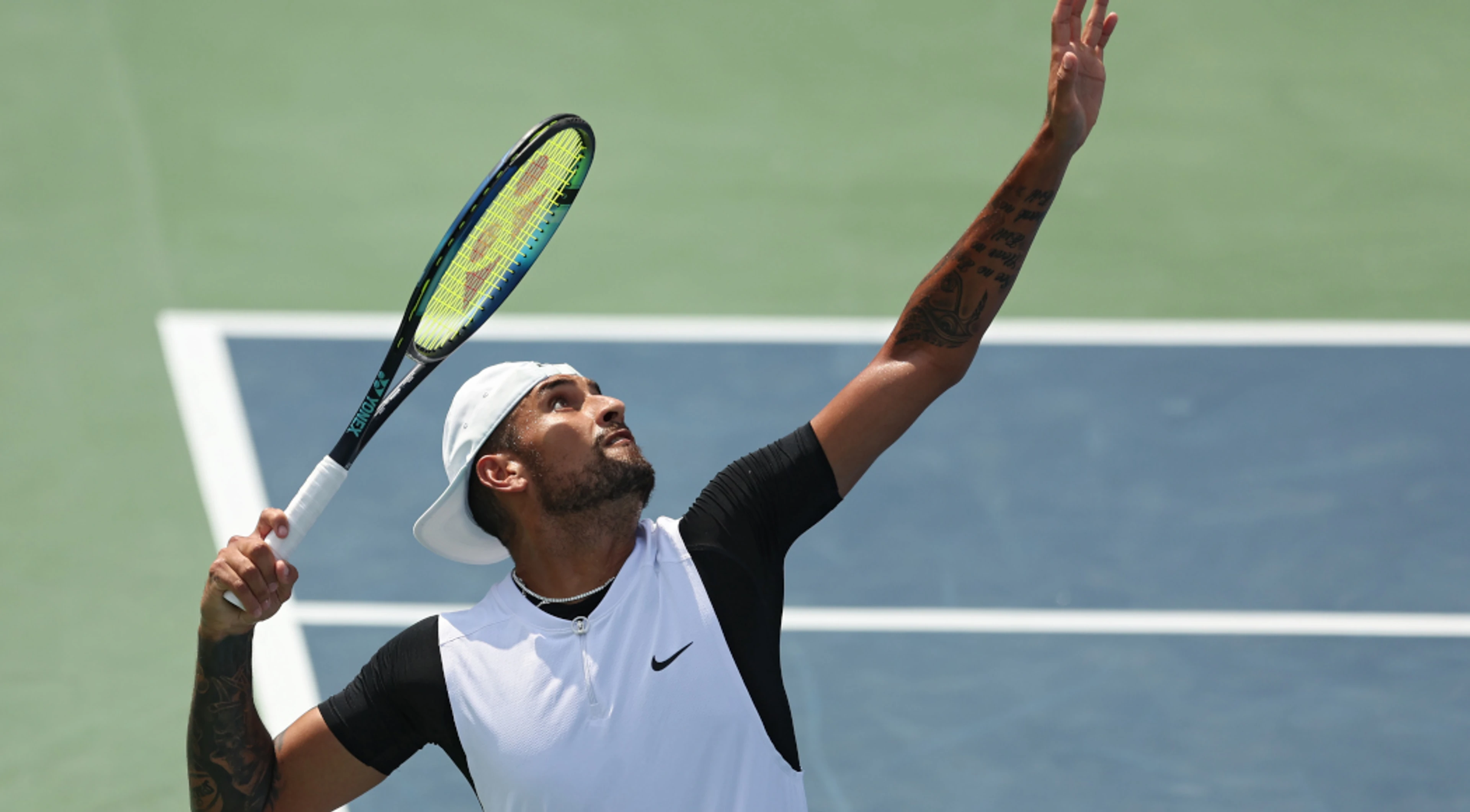 Kyrgios saves five matchpoints to tame Tiafoe in Washington