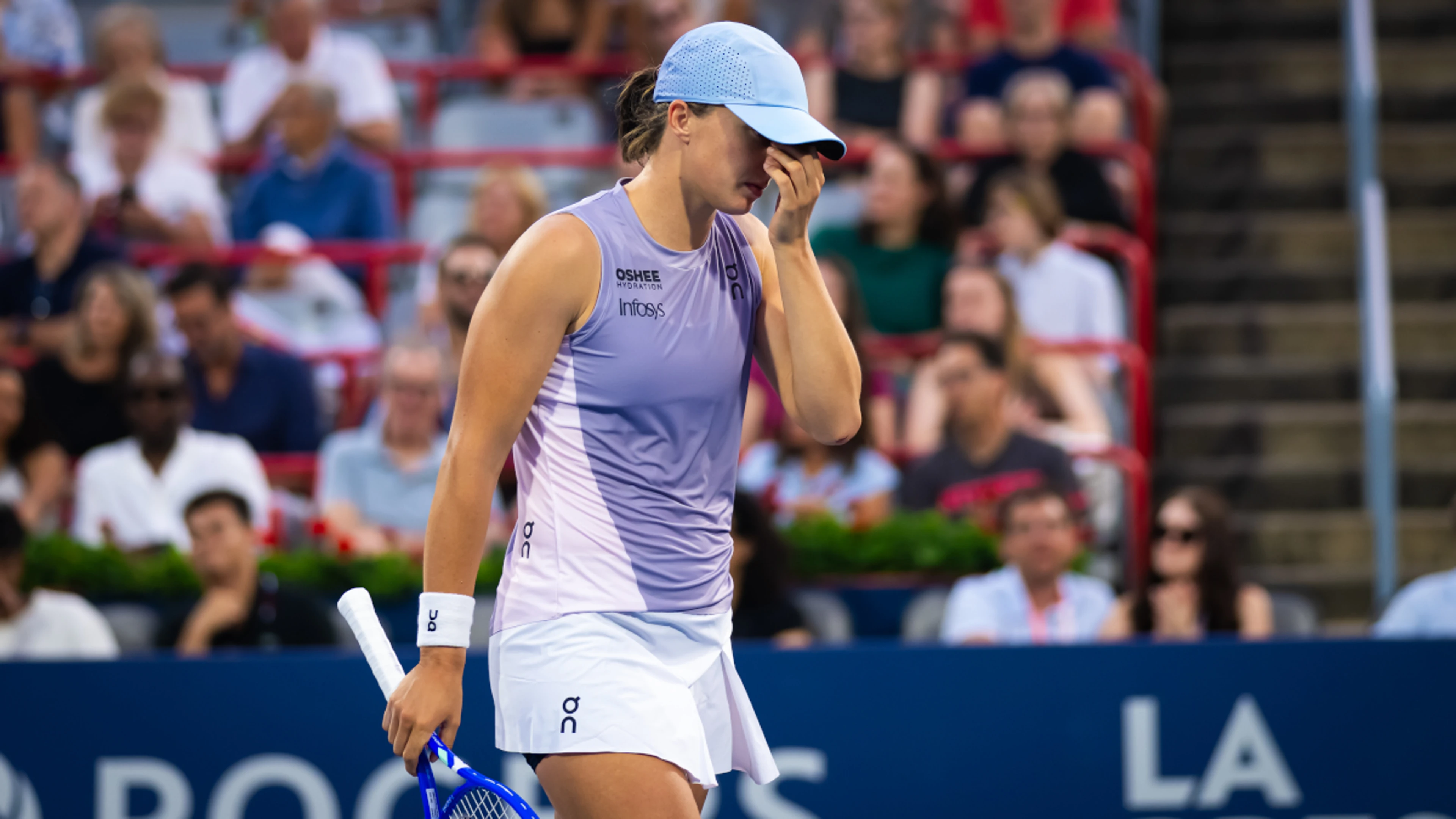 Swiatek crashes out of WTA Canadian Open, Osaka races through