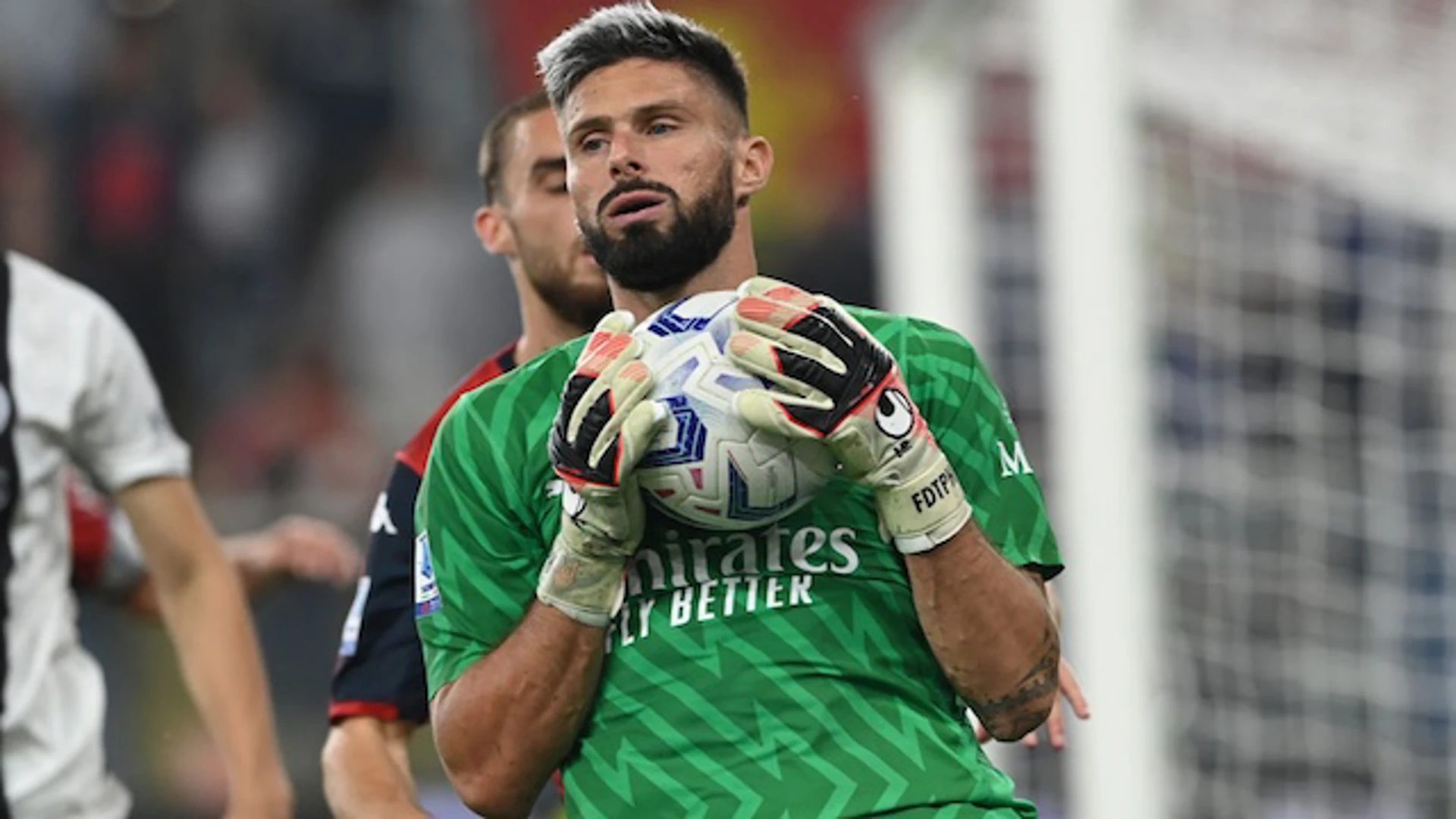 Olivier Giroud takes over as goalkeeper after Mike Maignan's red card