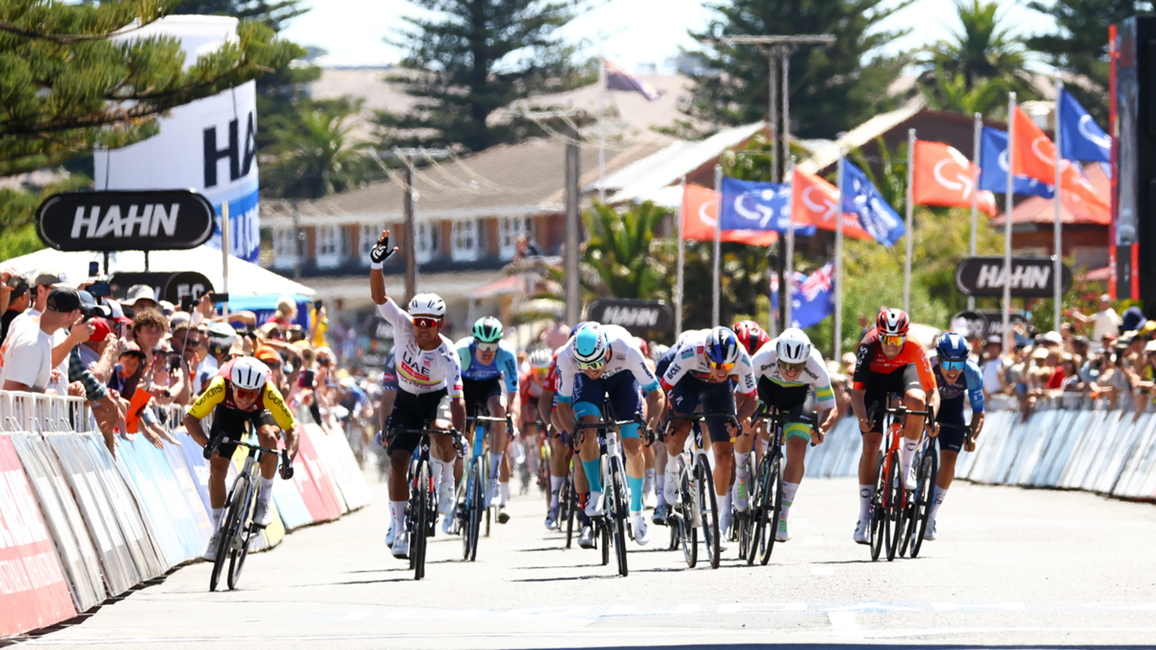 Coquard wins Down Under photo finish as Romo retains tour lead