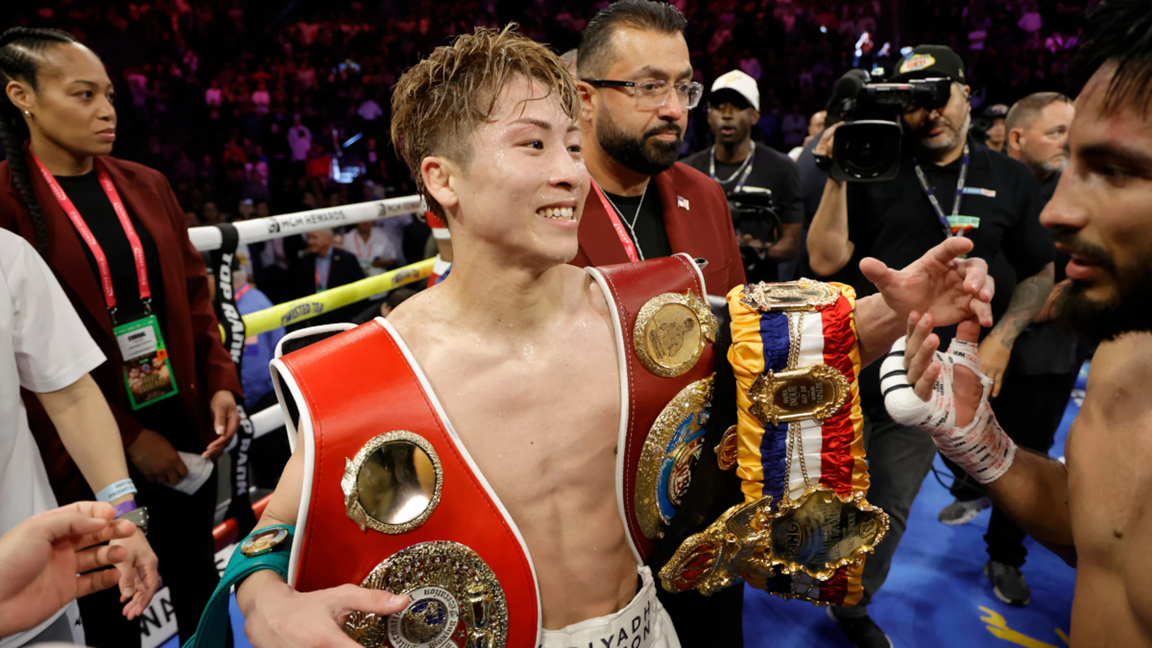 Inoue knocked down but stops Cardenas in eighth to keep crown