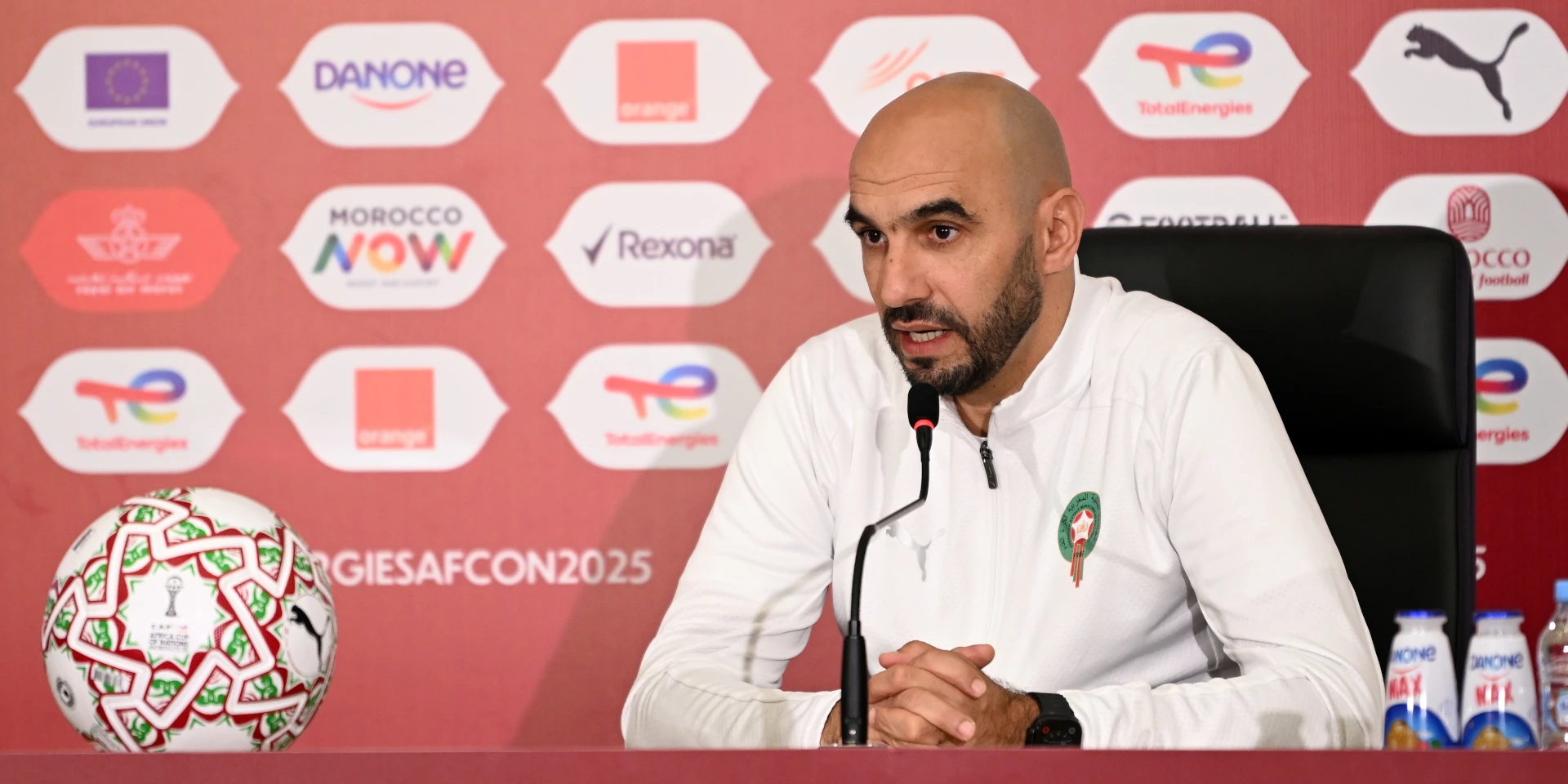 Morocco coach fights off critics as tournament tension mounts