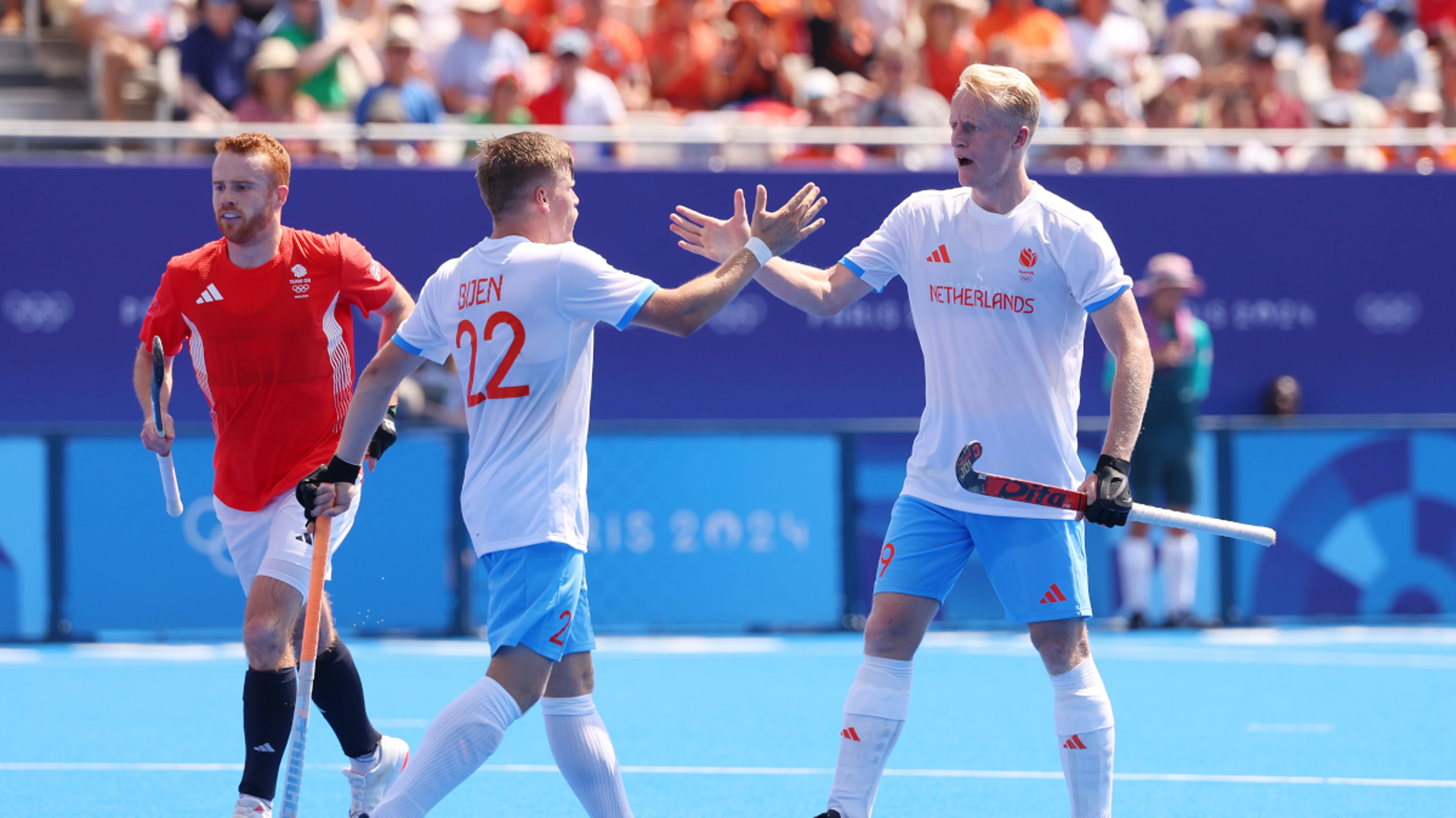 Dutch men draw with Britain in the heat, Belgium beat Australia for top spot