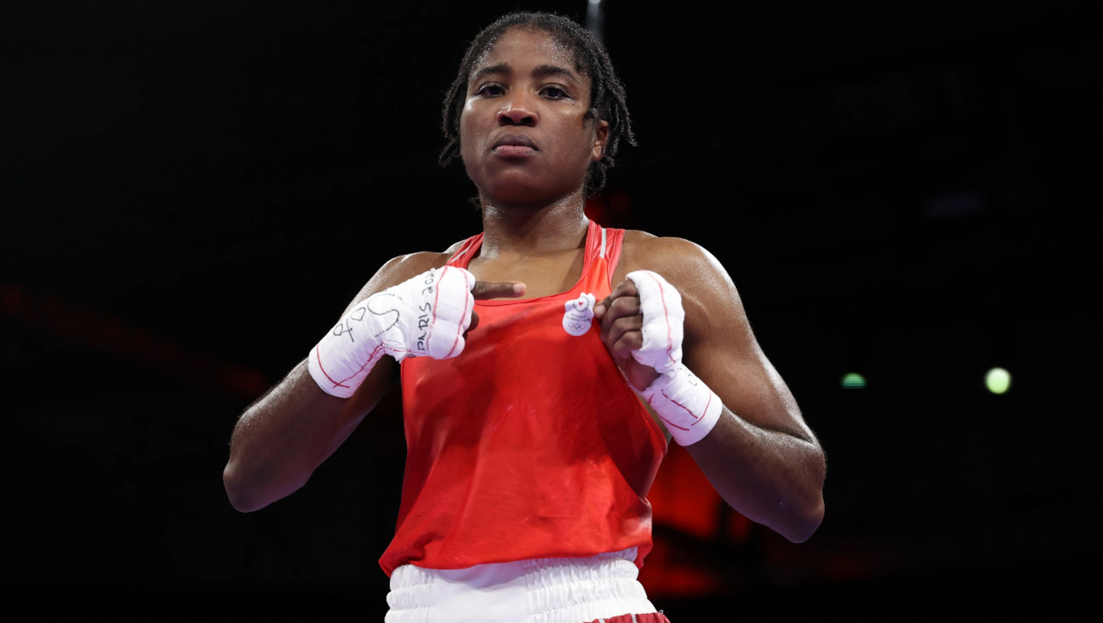 Ngamba makes history for refugee team with medal but job not done