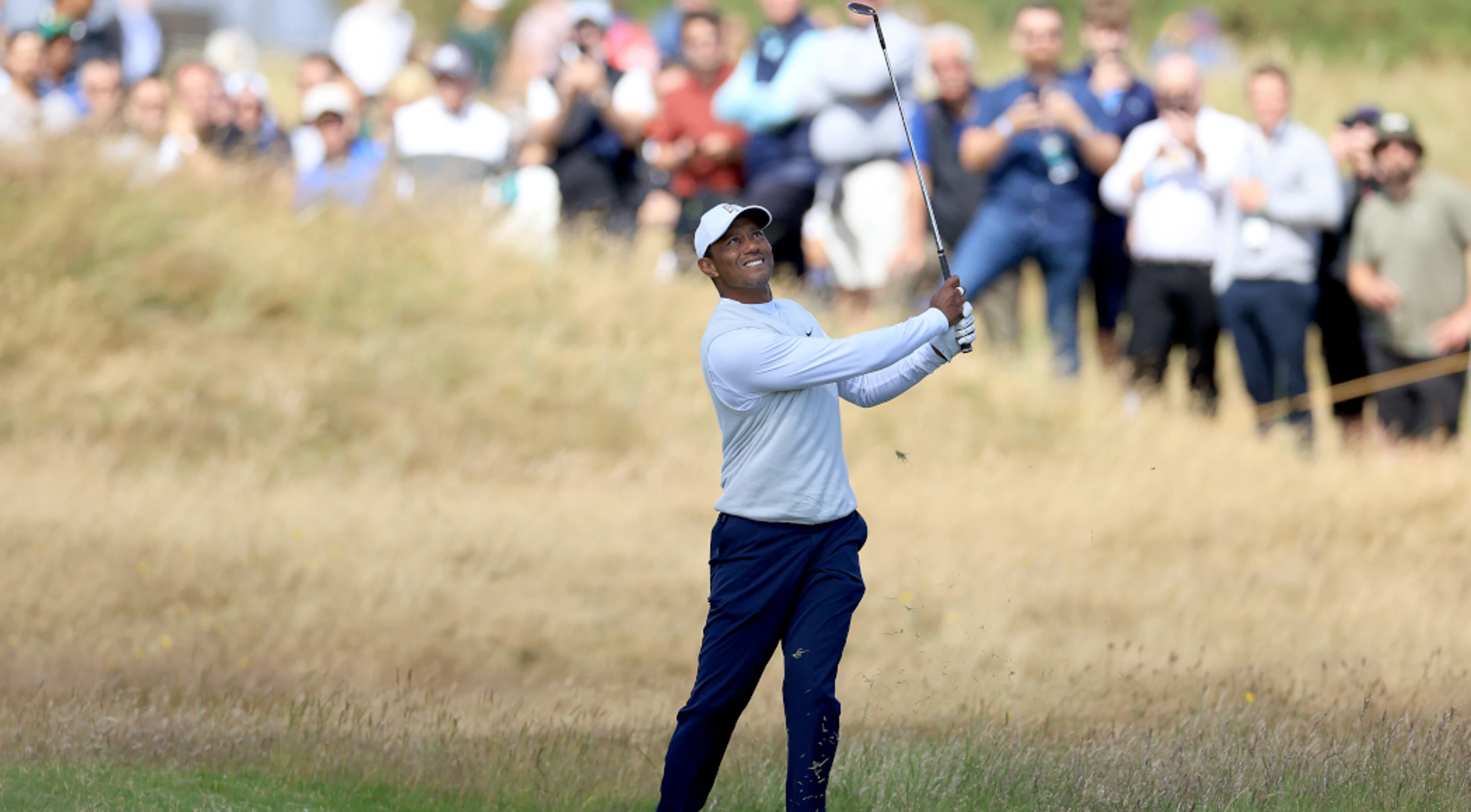 Tiger says 'tough road' ahead in recovery from foot injury