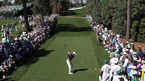 Adoring Augusta cheers Tiger into another Masters weekend
