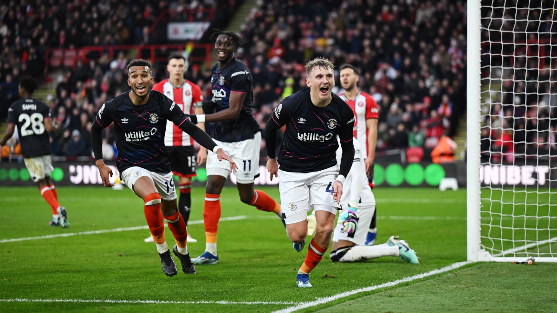 Luton force two late own goals to win at Sheffield United