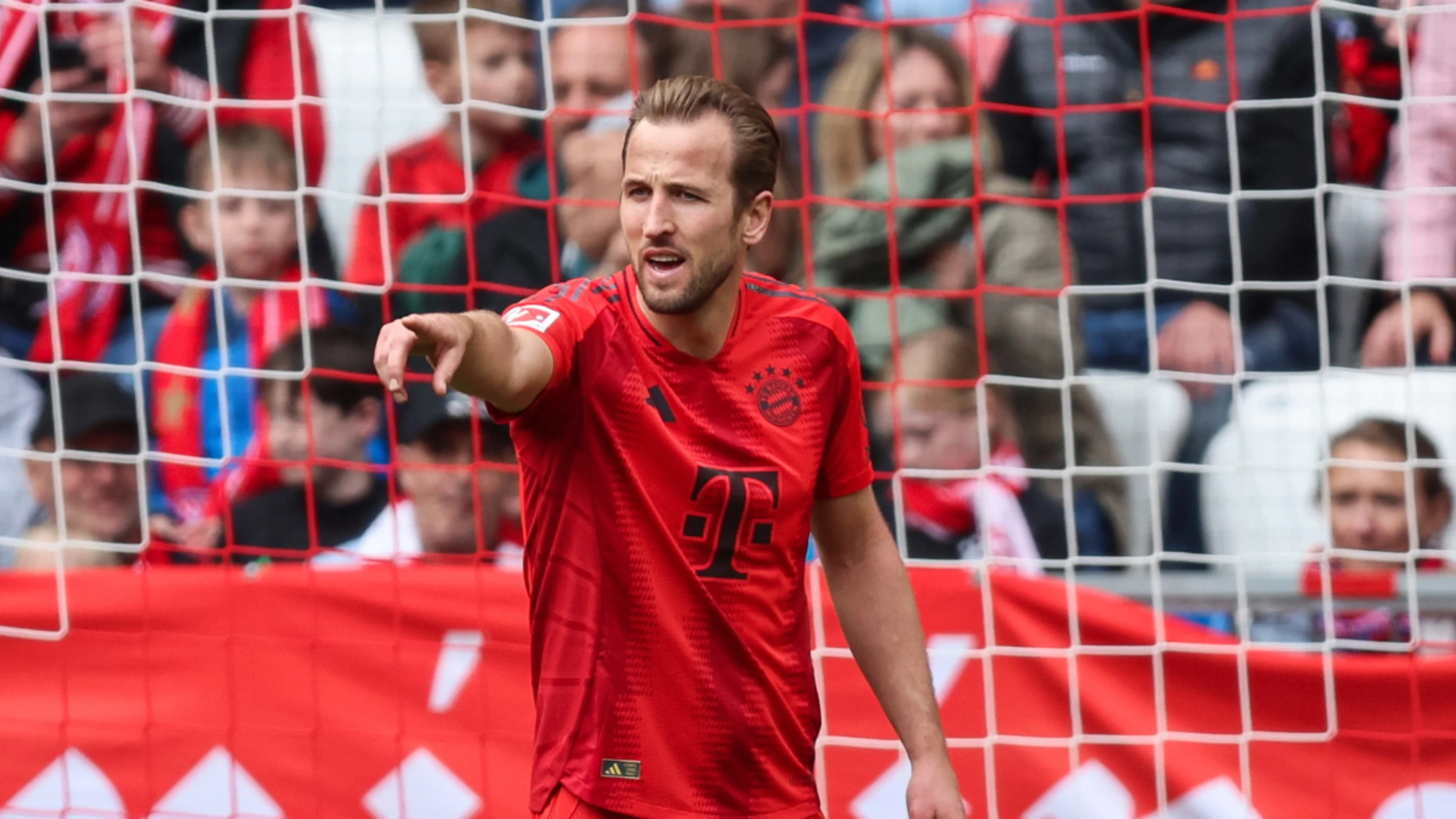 Kane slams yellow card decision as title-match ban looms