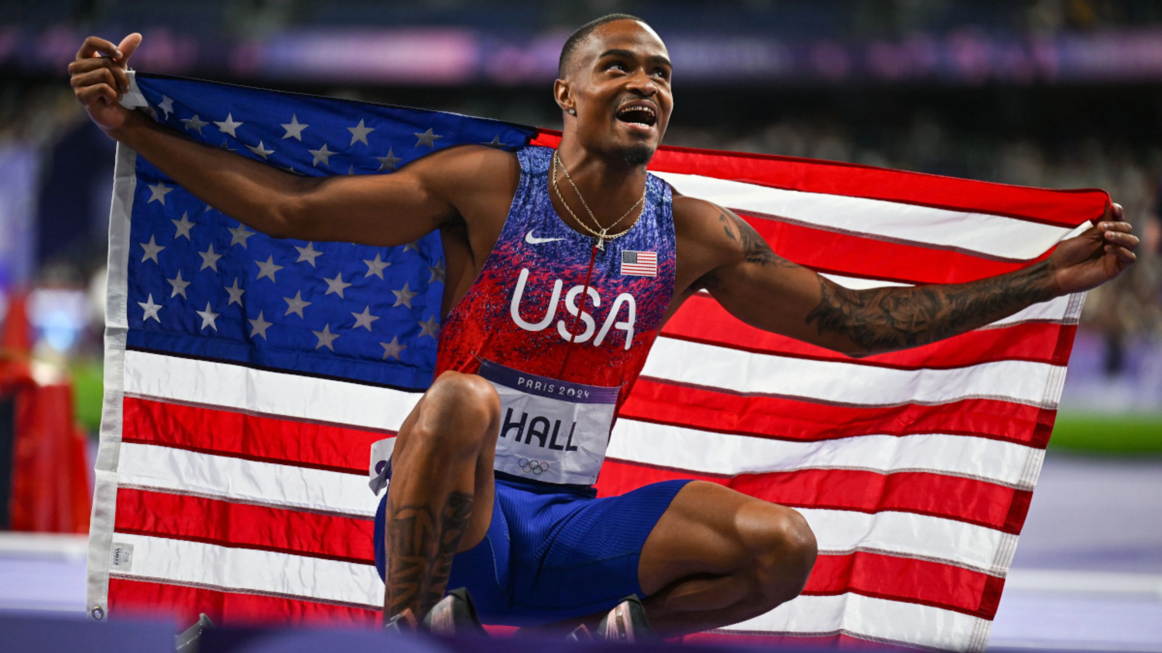 Lin moves into Olympic gold medal fight, Halls lands 400m track title