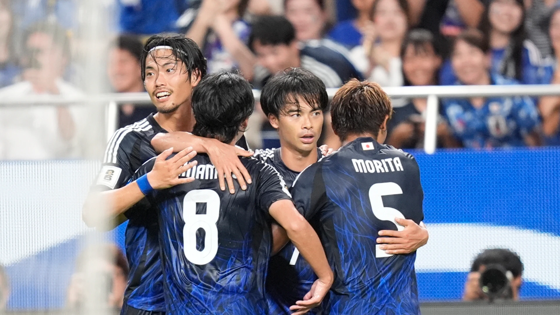 Japan hammer China, Australia stunned in World Cup qualifiers